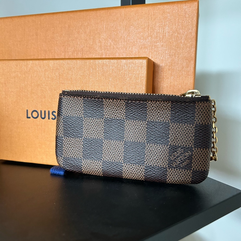 Authentic Louis Vuitton key pouch in Damiere Ebene